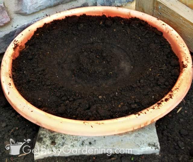 Ensure planter base is level before stacking pots