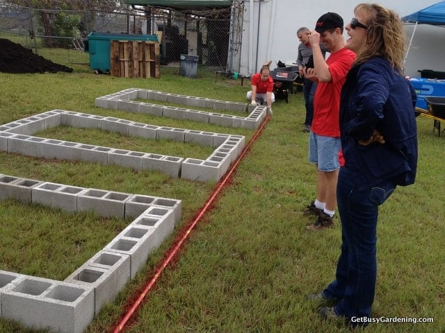 Measuring out the raised beds Measuring out the raised beds
