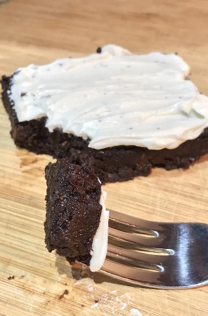 Chocolate zucchini brownies topped with buttercream icing