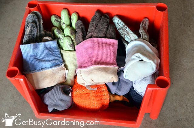 Neatly organized garden gloves in a container