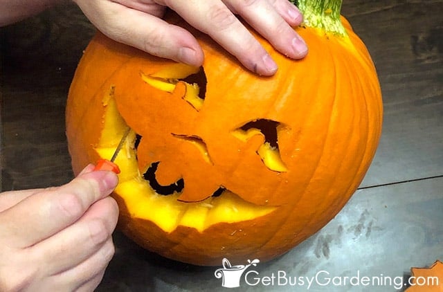 Carving a jack o lantern for Halloween