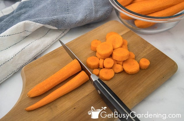 Cutting up carrots to freeze them