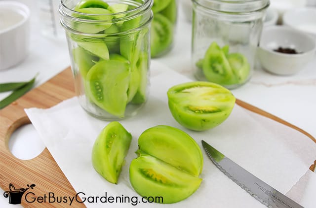 Cutting up green tomatoes for pickling
