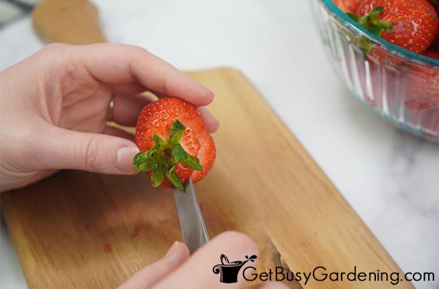 Preparing strawberries before making the jam