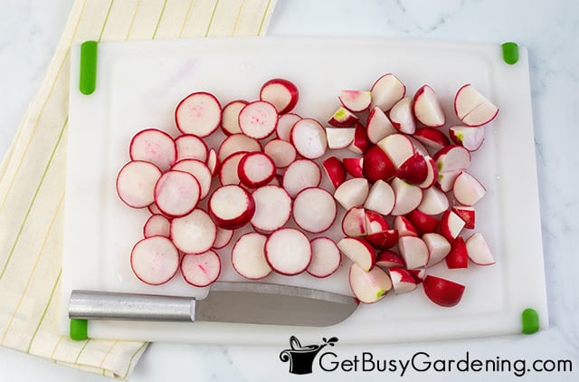 Cutting up radishes to freeze