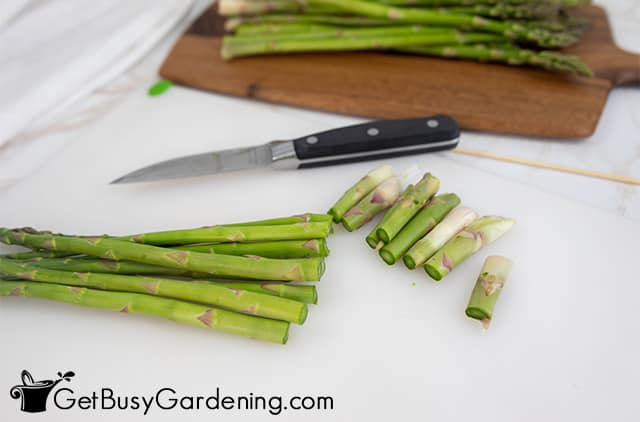 Cutting ends off asparagus before canning