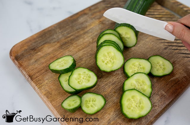 Cutting up cucumbers to freeze